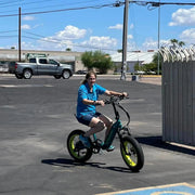 Rider on a Vtuvia SX20 folding fat tire e-bike